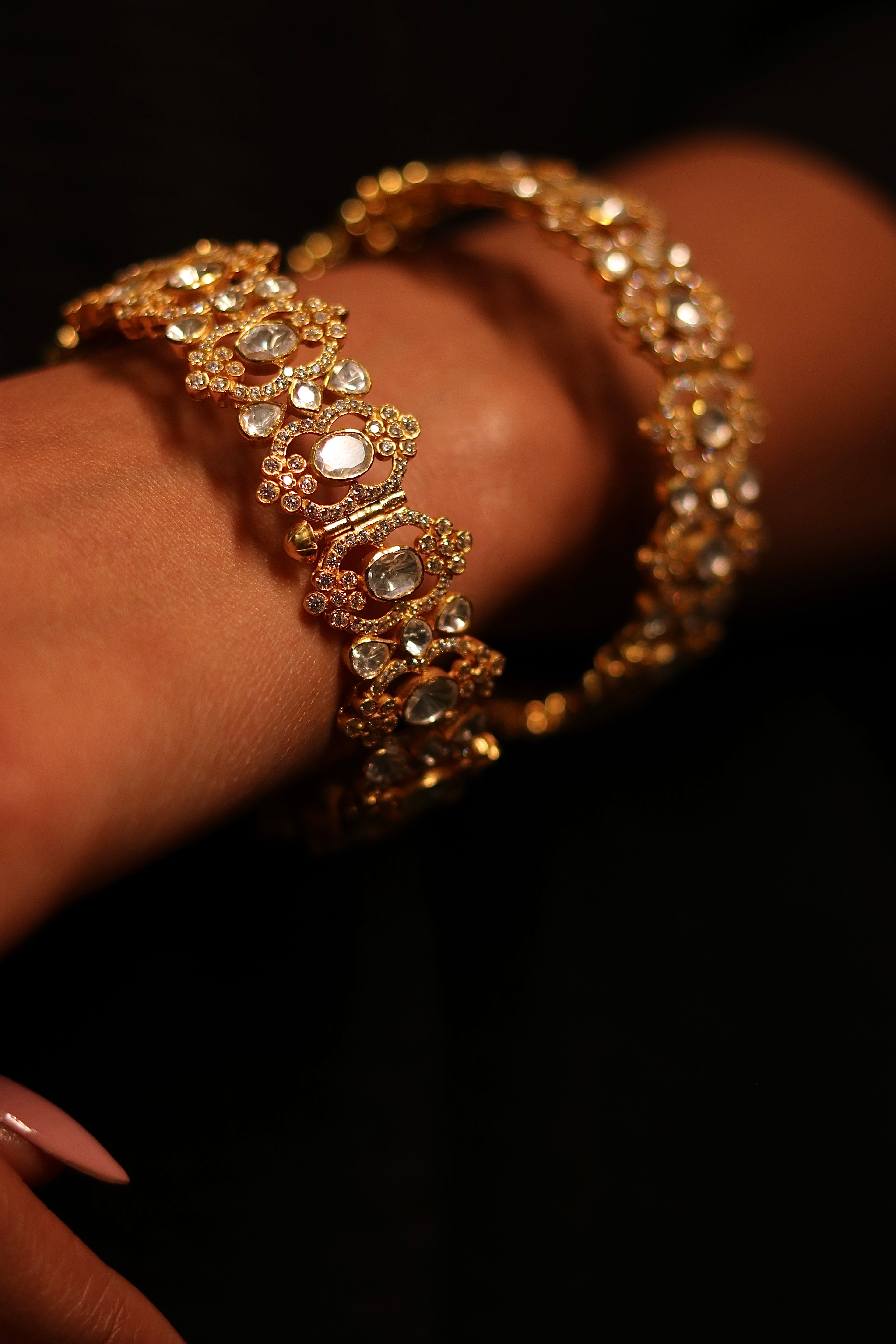 Sia Polki Jaali Bangles – pair of open filigree polki bangles with large moissanite polki stones in ornate gold frames and hand-worked AD lacework, handcrafted in Jodhpur