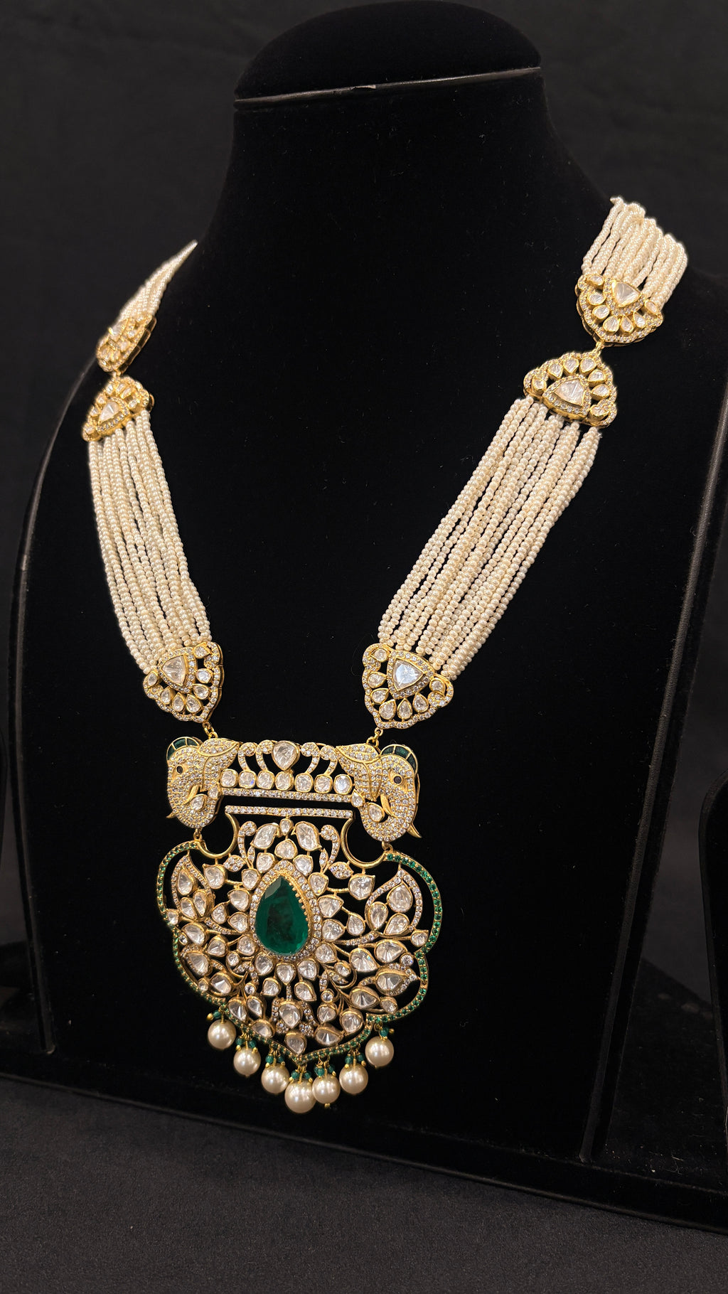 Sia Polki Mor Pankh Haar – grand peacock pendant polki long necklace with sixteen-strand seed pearl body, teardrop emerald centre, moissanite polki scrollwork and pearl drop fringe, handcrafted in Jodhpur