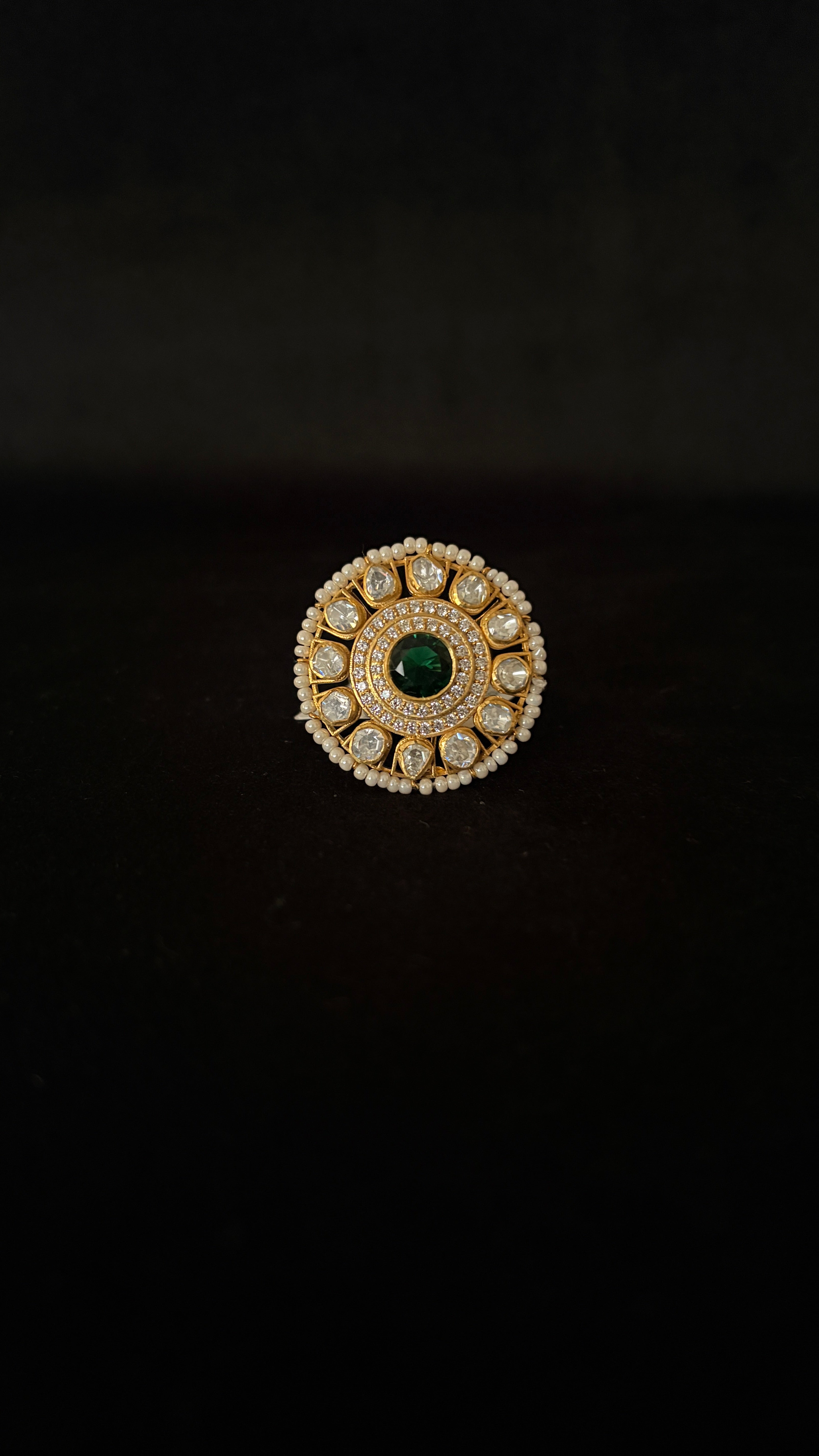 Sia Polki Panna Moti Ring – large round disc cocktail ring with oval emerald centre, moissanite polki spokes and seed pearl outer border, adjustable band, handcrafted in Jodhpur