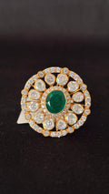 Sia Polki Panna Chakra Ring – open disc cocktail ring with oval emerald centre, eight moissanite polki spokes and AD outer circular border, adjustable band, handcrafted in Jodhpur