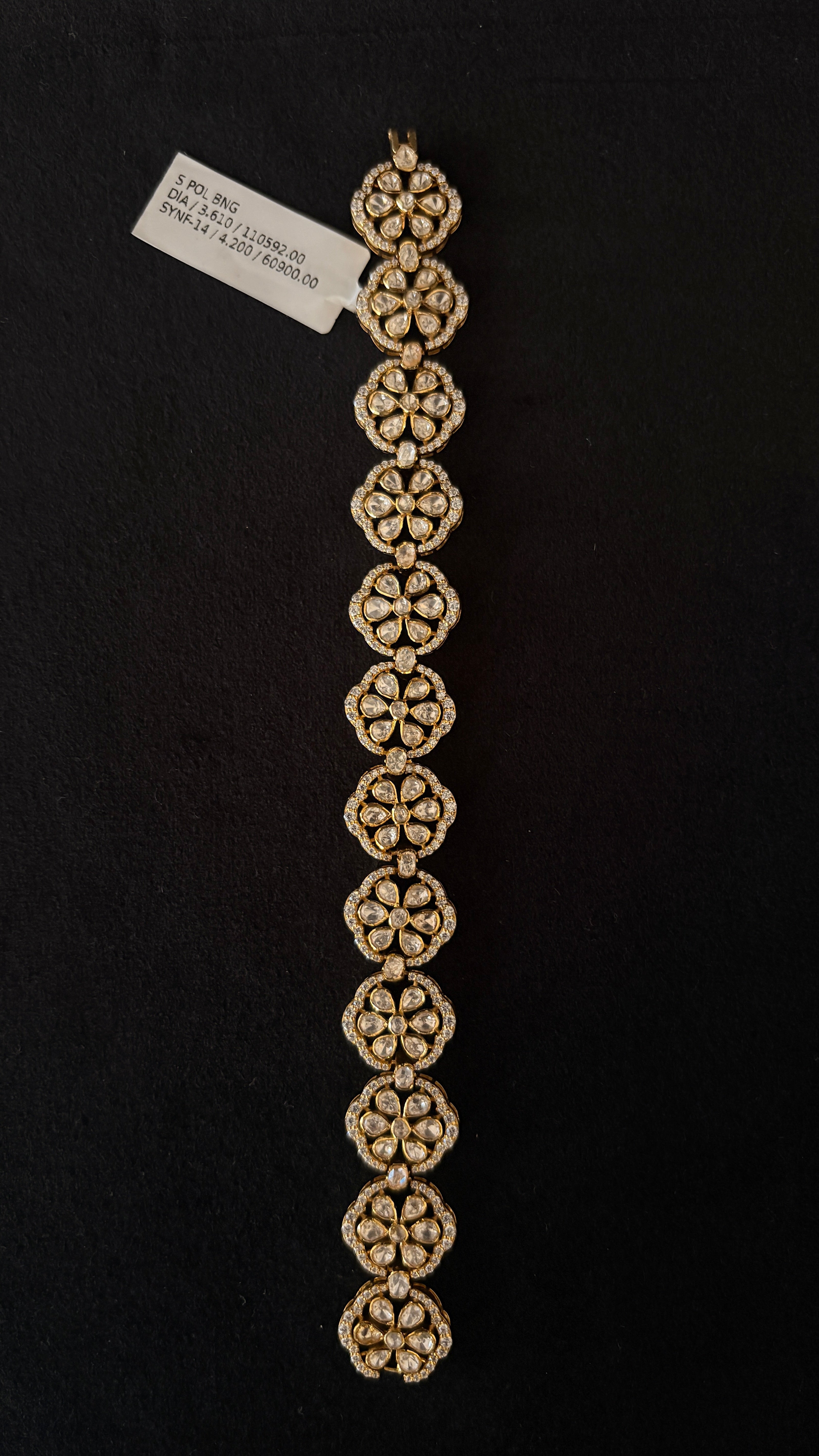 Sia Polki Phool Bracelet – ten linked circular floral polki medallions with four-petal moissanite polki and AD border, handcrafted in Jodhpur