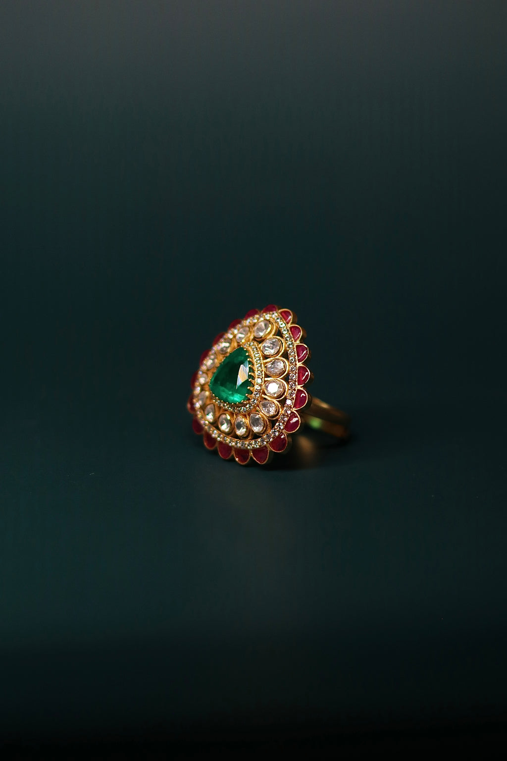 Sia Polki Panna Dil Ring – grand dome cocktail ring with heart-shaped emerald centre, moissanite polki halo and ruby red petal border, adjustable band, handcrafted in Jodhpur