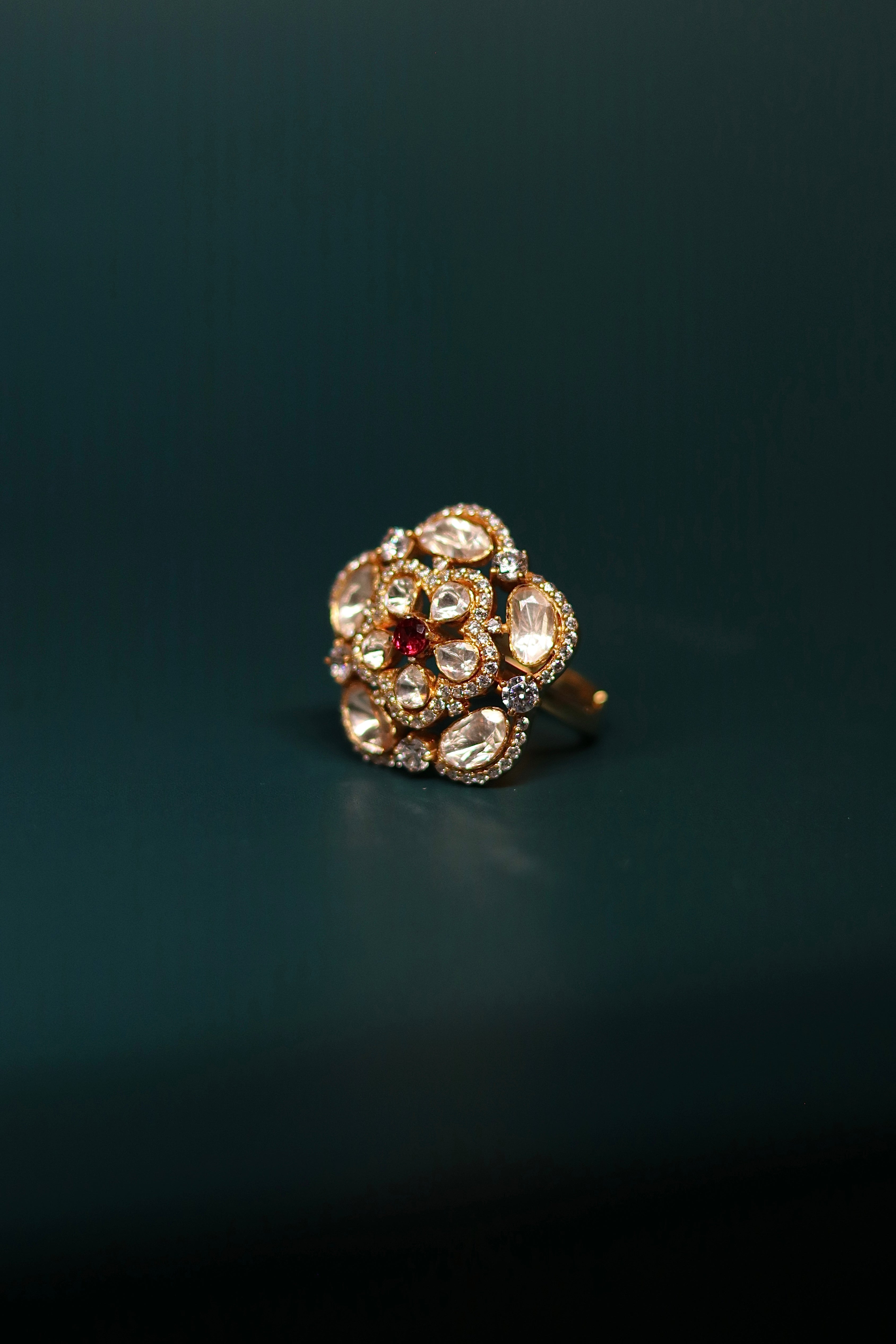Sia Polki Gathri Ring – high dome cluster cocktail ring with large irregular moissanite polki stones, single ruby centre accent and AD border, adjustable band, handcrafted in Jodhpur