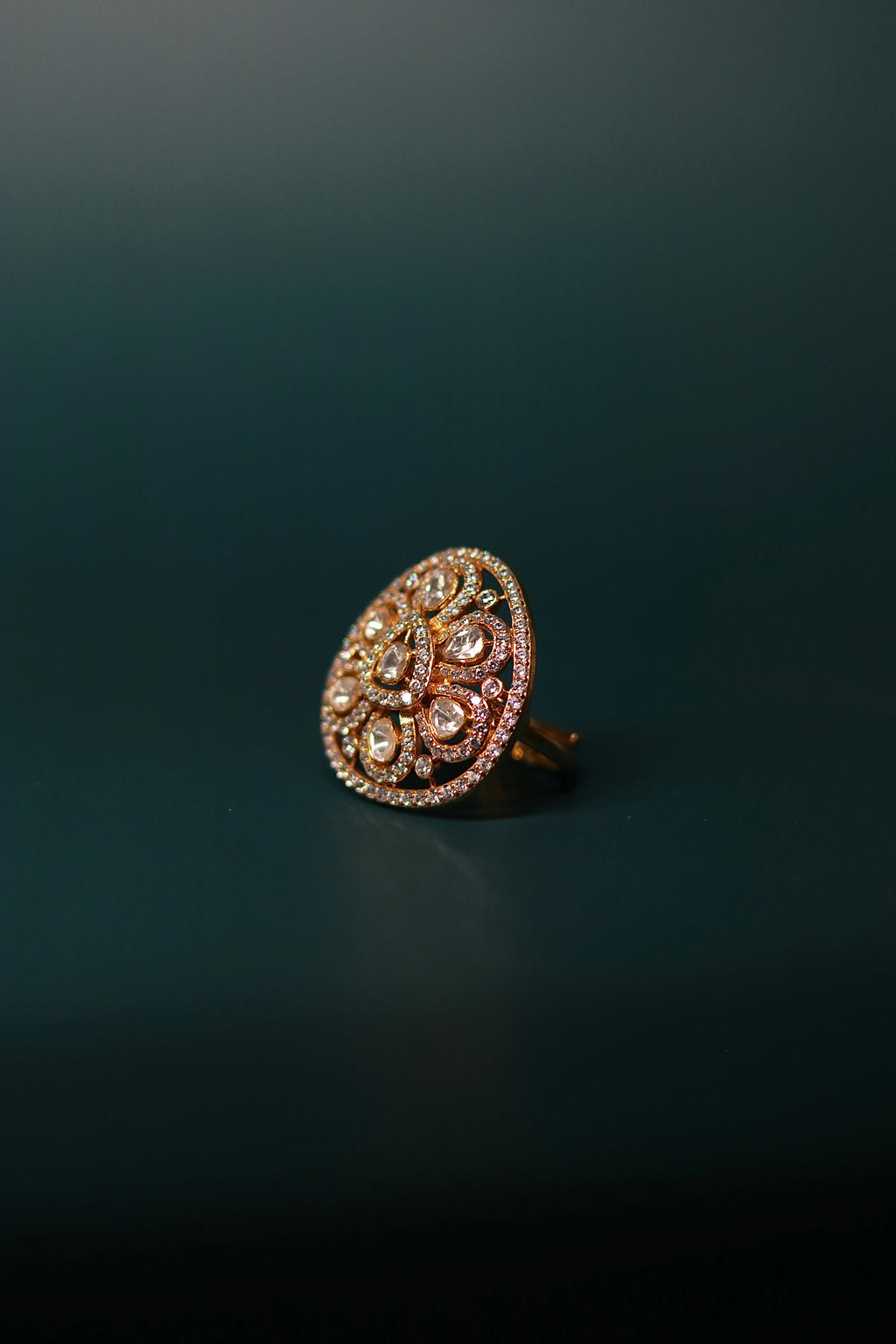 Sia Polki Dhaal Ring – large oval shield cocktail ring with moissanite polki in scrollwork vine formation and AD border, adjustable band, handcrafted in Jodhpur