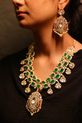 Zehra emerald polki haar set worn on model — 925 sterling silver gold plated bridal necklace with matching chandbali earrings by Sia Polki